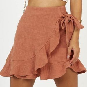 Showpo Wrap mini skirt size 2 NWT